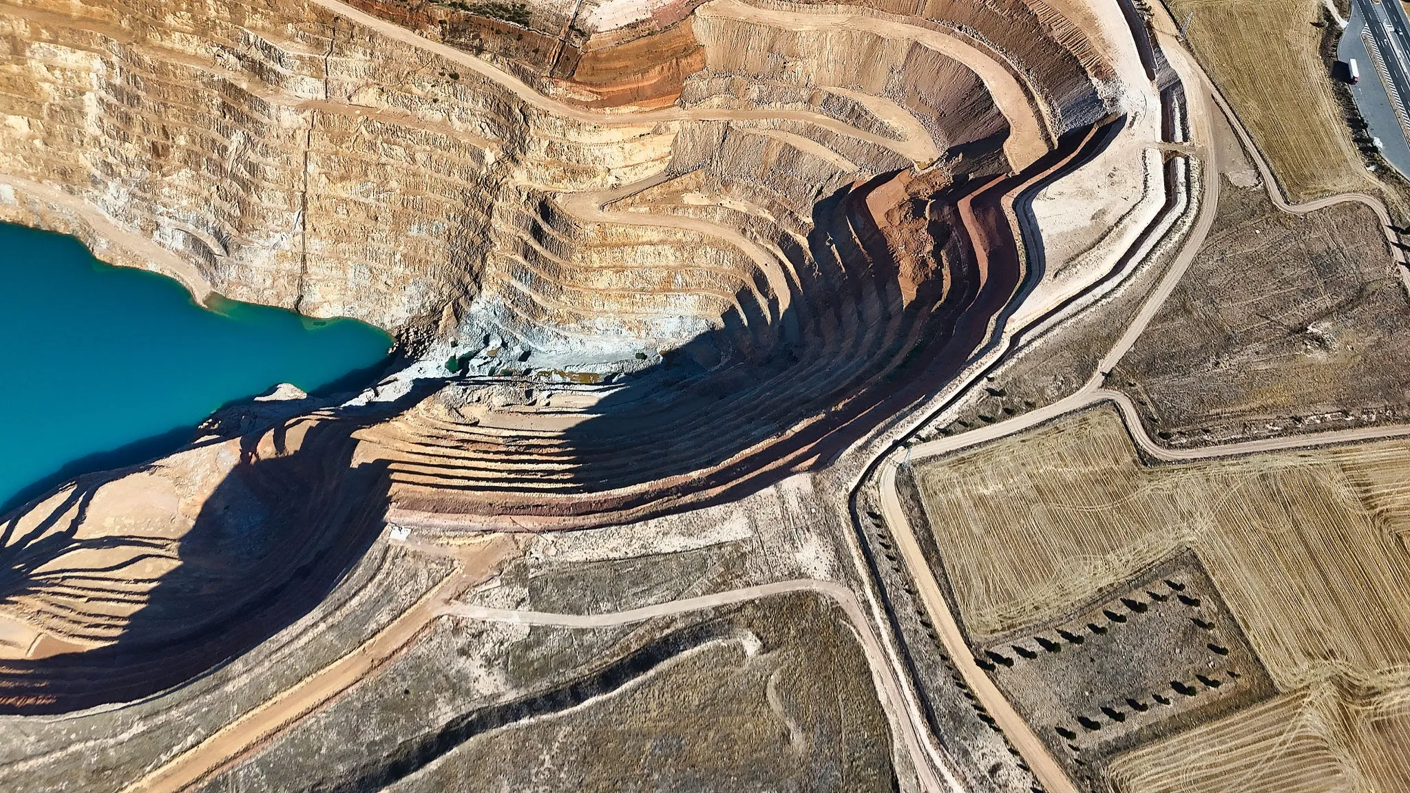 Aerial view of an open-pit mine used as an illustrative stock photograph